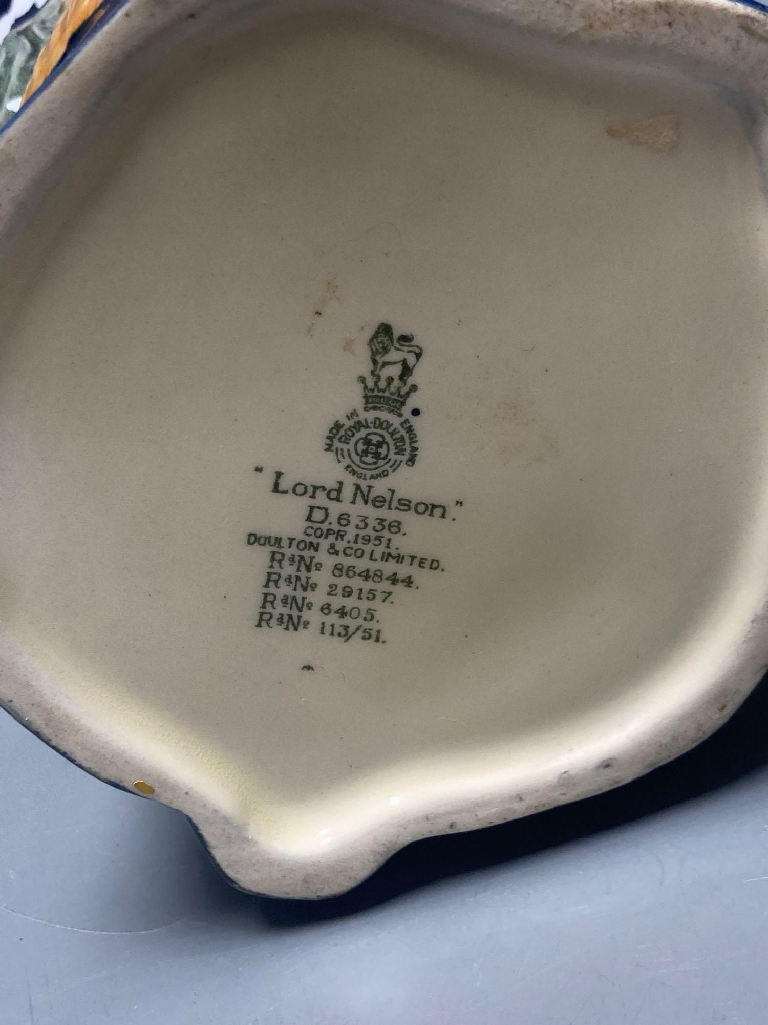 A Royal Doulton Lord Nelson character jug, Royal Doulton Monty character jug